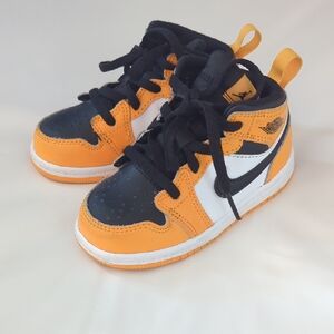 Nike Kids' Black and Orange Air Jordans